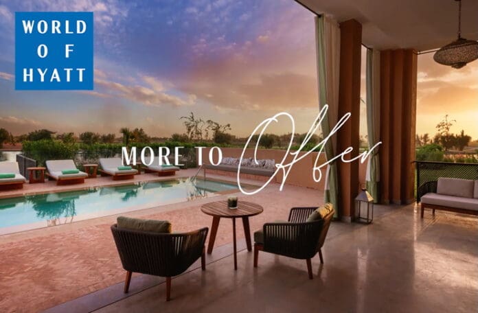 a pool and chairs in a room