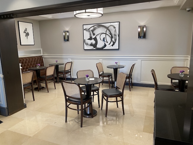a room with tables and chairs