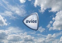 a triangular shaped object with text in the air