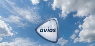 a triangular shaped object with text in the air