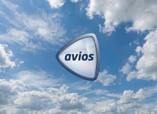 a triangular shaped object with text in the air