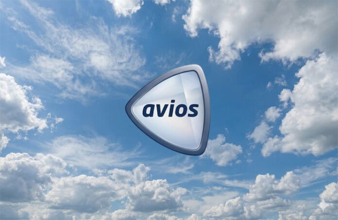 a triangular shaped object with text in the air