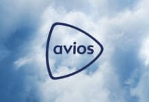 a triangle shaped object with text in the middle of clouds