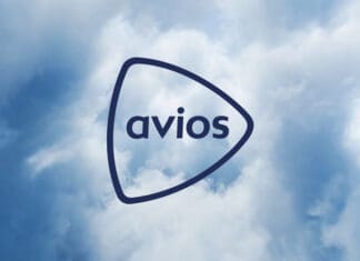 a triangle shaped object with text in the middle of clouds