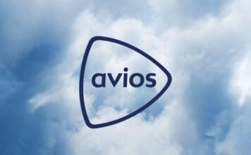 Buy Avios and earn bonus Tier Points with Finnair a triangle shaped object with text in the middle of clouds