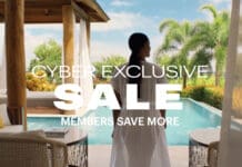 a woman in a white dress by a pool