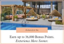 a pool with wicker chairs and a pool with a large window