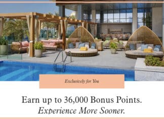 a pool with wicker chairs and a pool with a large window