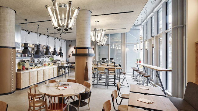 a restaurant with tables and chairs