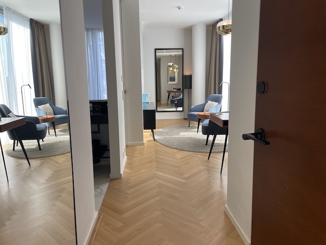 a room with a mirror and a table