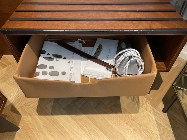 a brown box with items in it