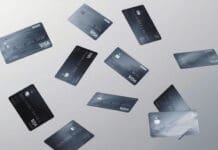 a group of credit cards flying