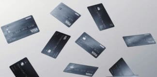a group of credit cards flying