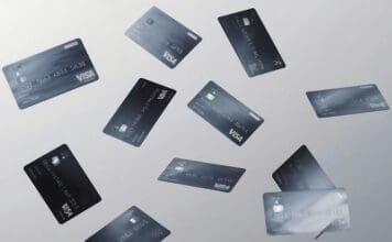 a group of credit cards flying