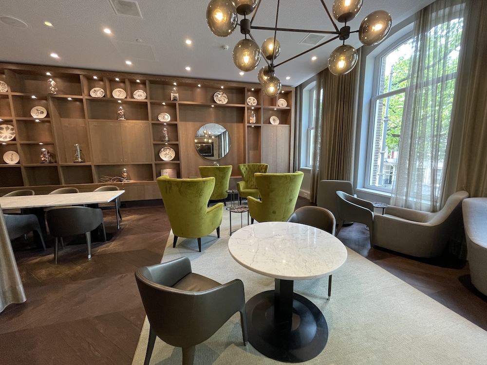 a room with a table and chairs