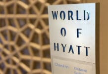 The World of Hyatt changes are going to be painful (the numbers say so) a sign with text on it